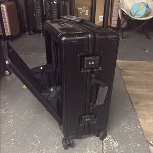 Black Hard Shell Rolling Suitcase